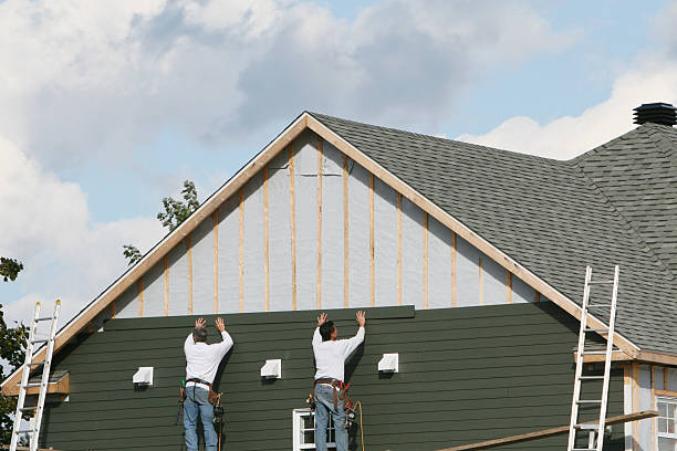 Professional Siding Repair technician working in Mentcle, PA